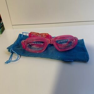 Brand new EverSport pink goggles with storage/travel pouch